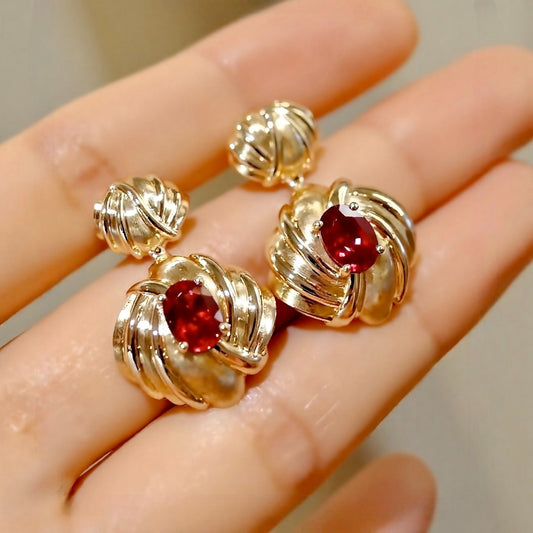 Ravelle drop earrings with 1ct lab grown rubies and draped gold design








