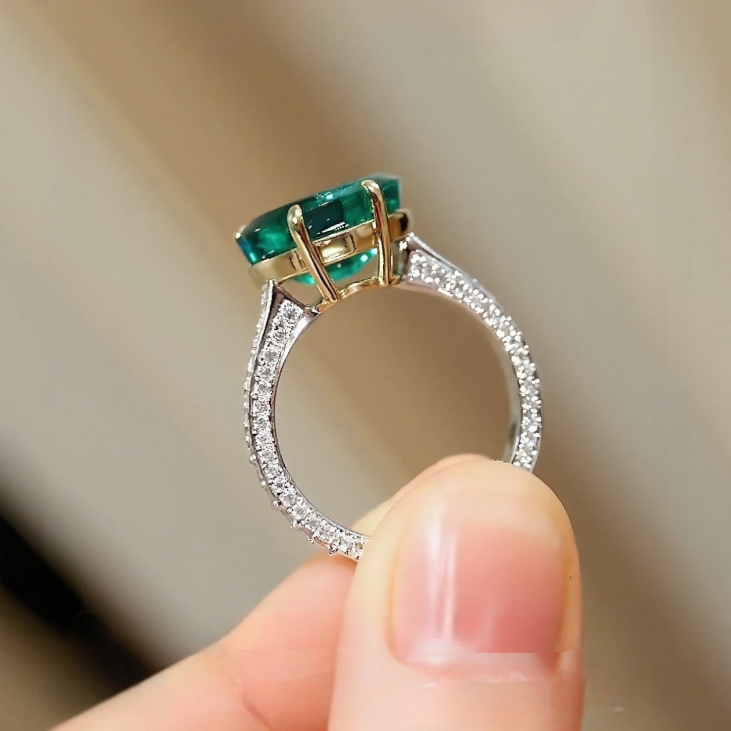 Emara heart-shaped lab emerald ring with pavé diamond band








