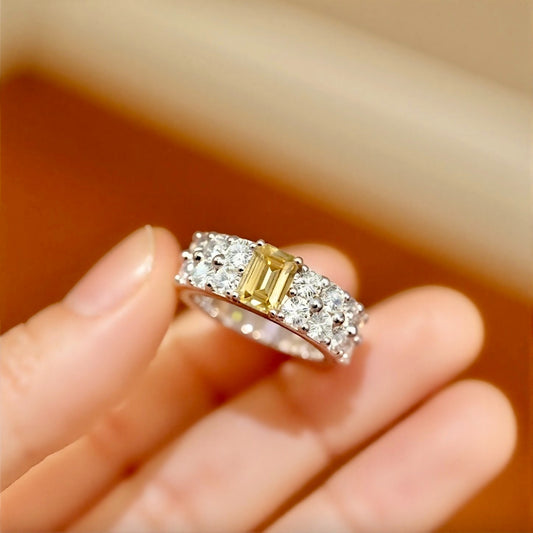 Valora eternity ring with radiant yellow lab diamond and full diamond band in white gold








