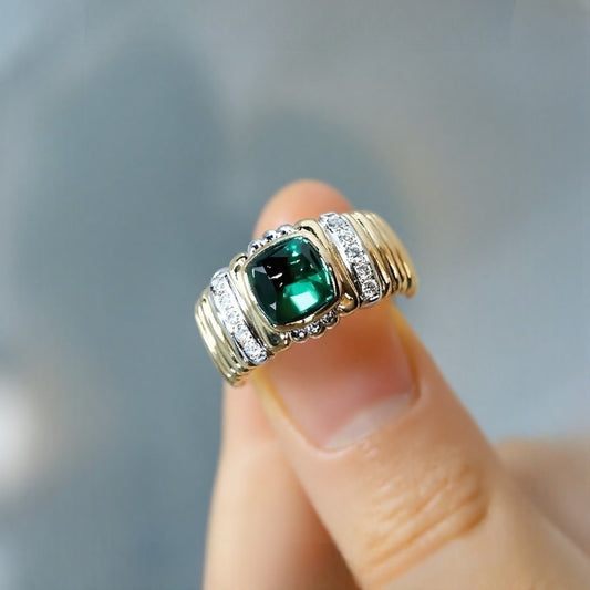 Bold gold ring with 1.8ct lab-grown sugarloaf emerald and diamond accents








