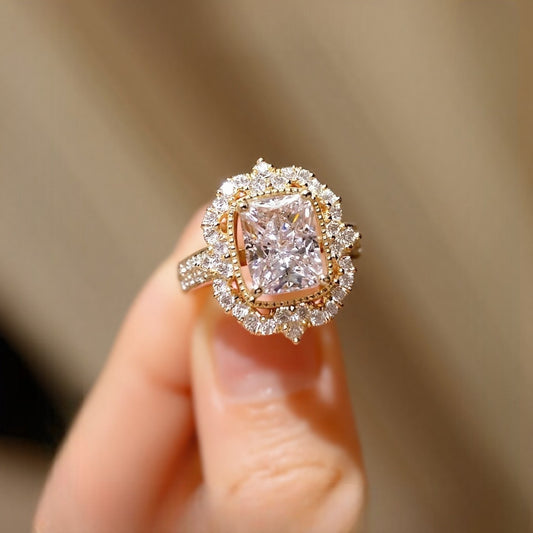 Radiant cut lab-grown diamond ring with halo and rose gold bezel setting








