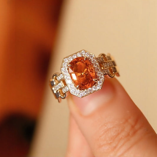 Gold ring with 2ct natural Fanta garnet and diamond halo detailing


2/2









