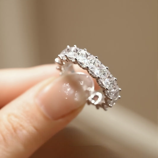 Princess-cut lab diamond eternity ring in solid white gold with geometric design