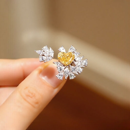 Lirael floral white gold ring with heart-shaped yellow diamond and white diamond halo









