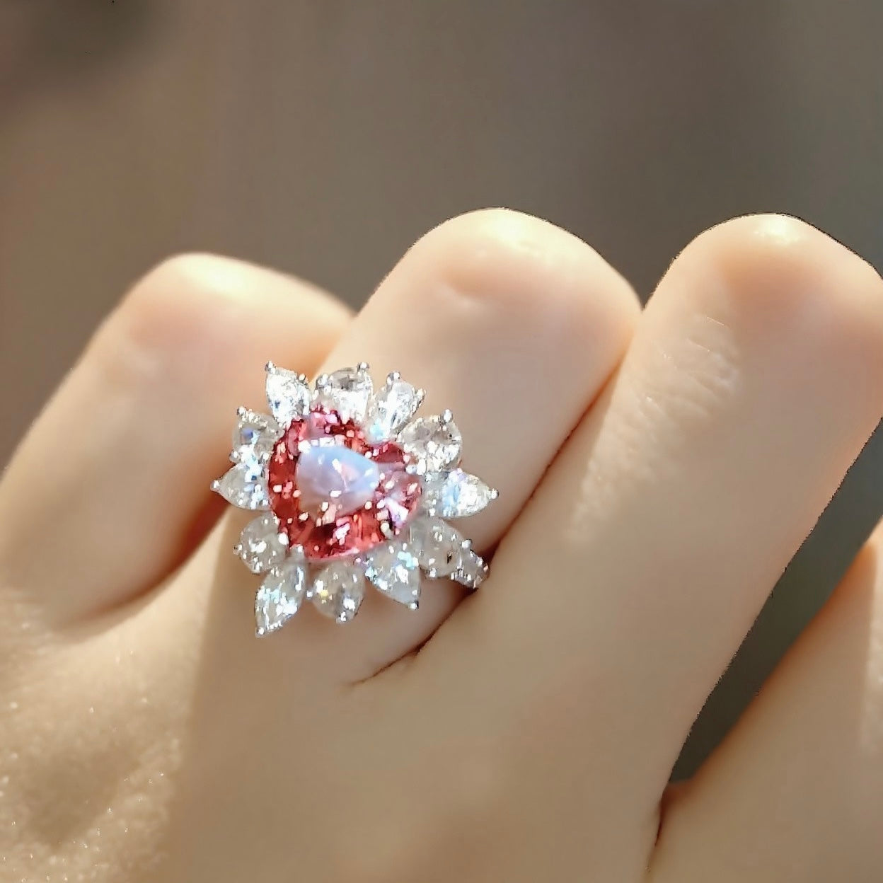 Romantic heart-shaped lab padparadscha sapphire ring with diamond halo
