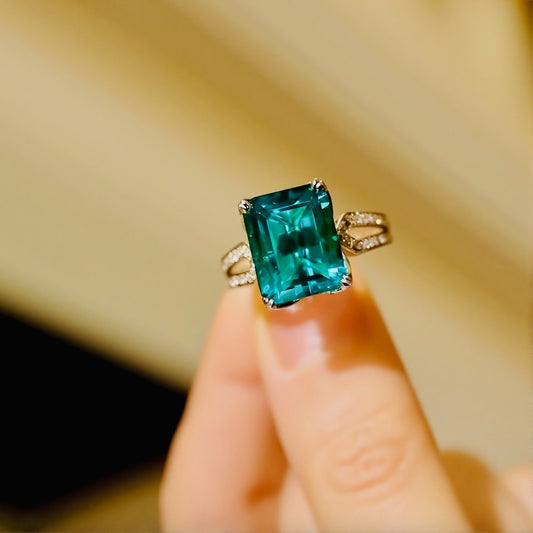 Kaelis 4ct emerald-cut lab grown emerald ring with pavé diamond open band









