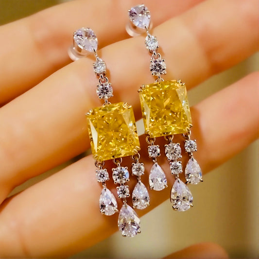 Elegant drop earrings with radiant 4ct lab-grown yellow diamonds and white diamond accents








