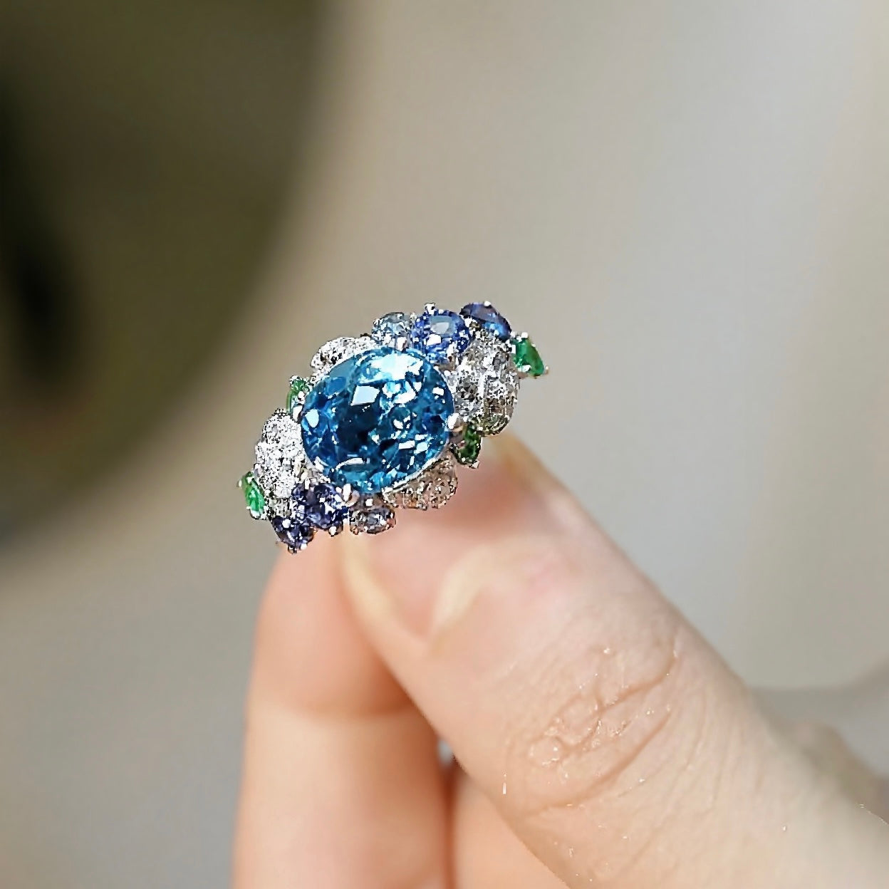 Elanora aquamarine and tanzanite ring with tsavorite and diamond accents in white gold