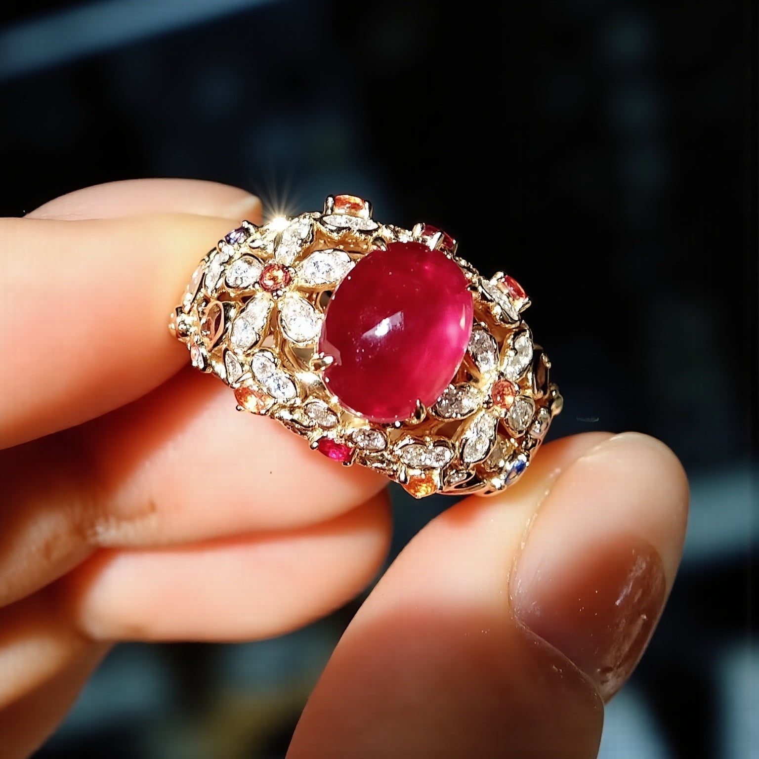 Seraphiel floral ring with 2.5ct lab ruby and diamond-studded petals in a vintage gold setting