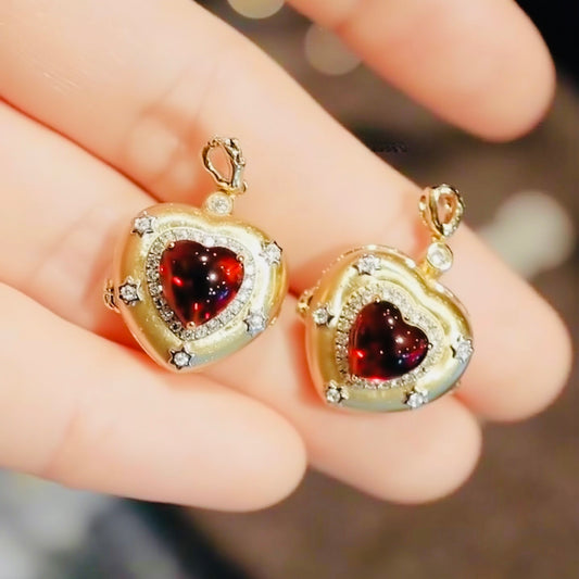 Rosamour heart pendant with lab ruby center

