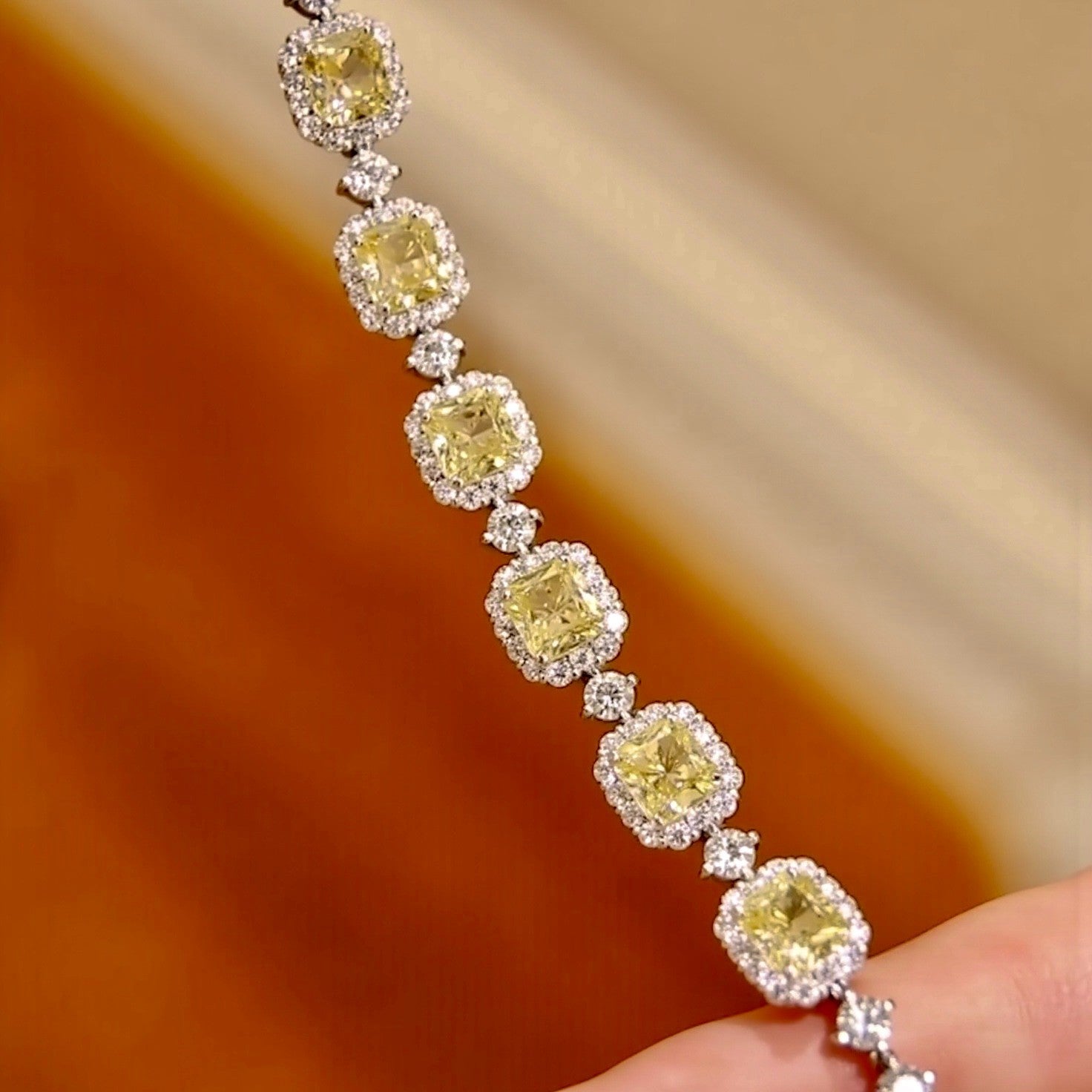 Nyara bracelet with six 1ct cushion lab diamonds and halo accents
