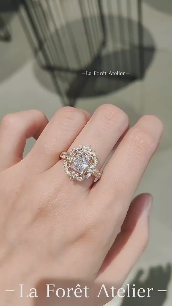Radiant cut lab diamond halo ring in rose gold with marquise and round diamond petals


1/2








