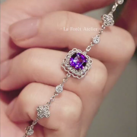 Cushion-cut purple sapphire bracelet in silver setting


