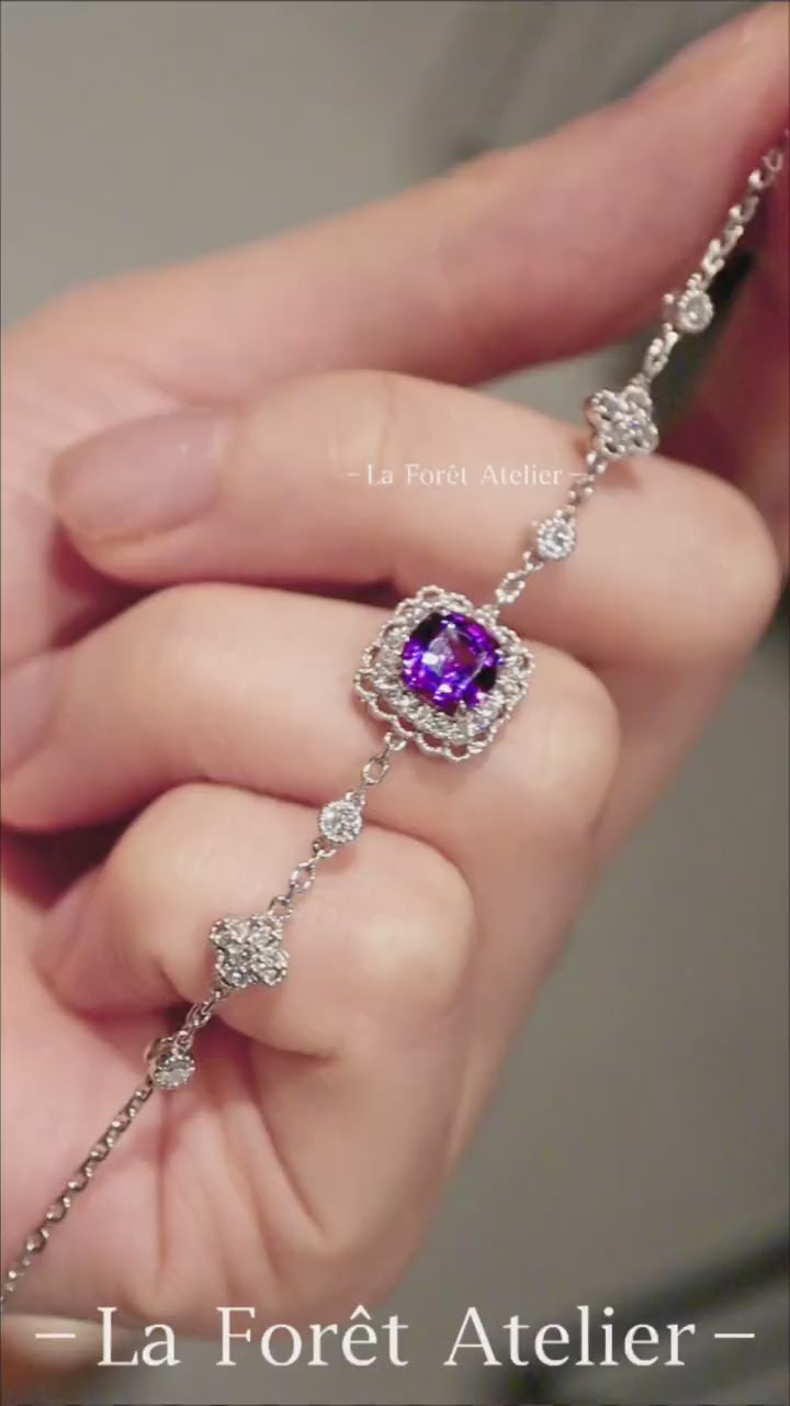 Cushion-cut purple sapphire bracelet in silver setting

