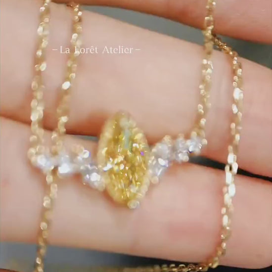 Elegant gold necklace featuring 2ct fancy yellow diamond



