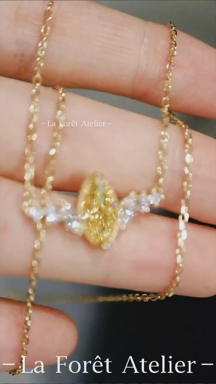 Elegant gold necklace featuring 2ct fancy yellow diamond


