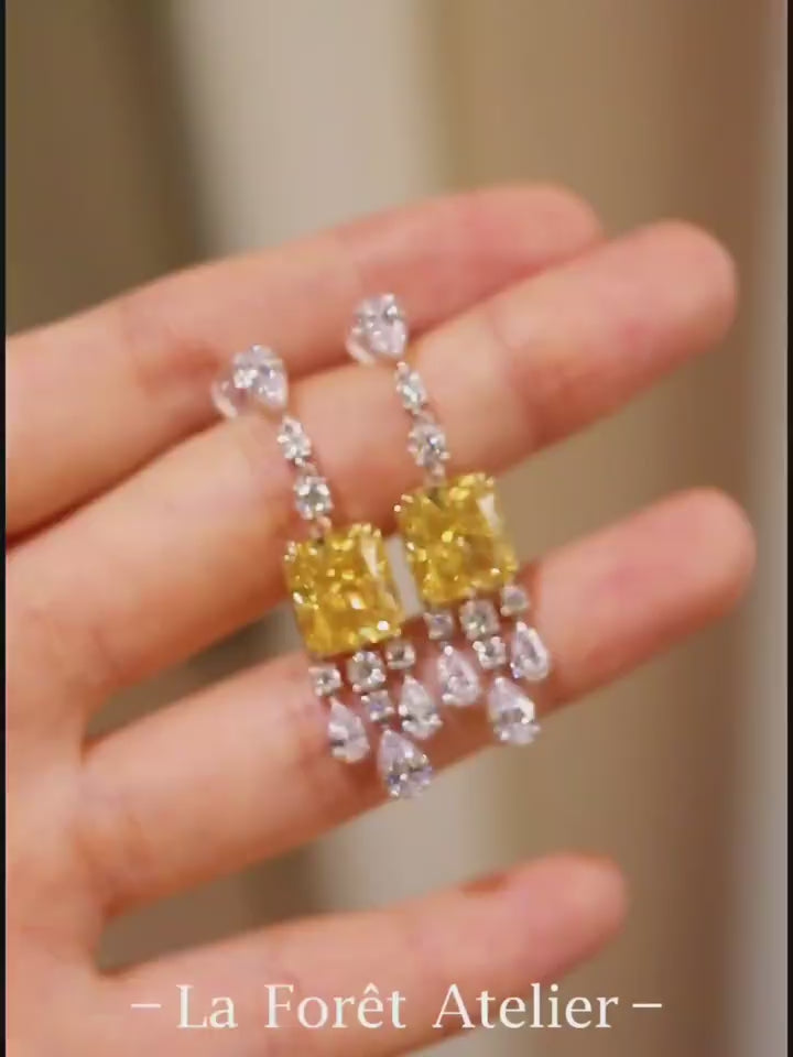 Elegant drop earrings with radiant 4ct lab-grown yellow diamonds and white diamond accents








