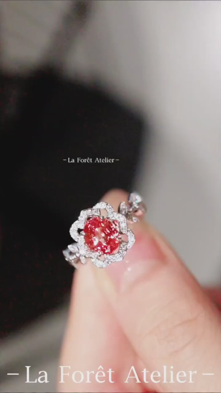 Floral-inspired padparadscha sapphire engagement ring

