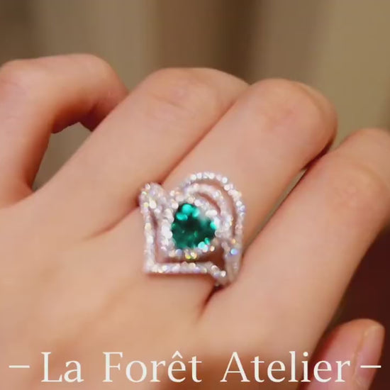 Discover the Elarin ring featuring a 2ct lab-grown paraiba in trillion cut with diamond drape halo—bold, modern, and radiant.

