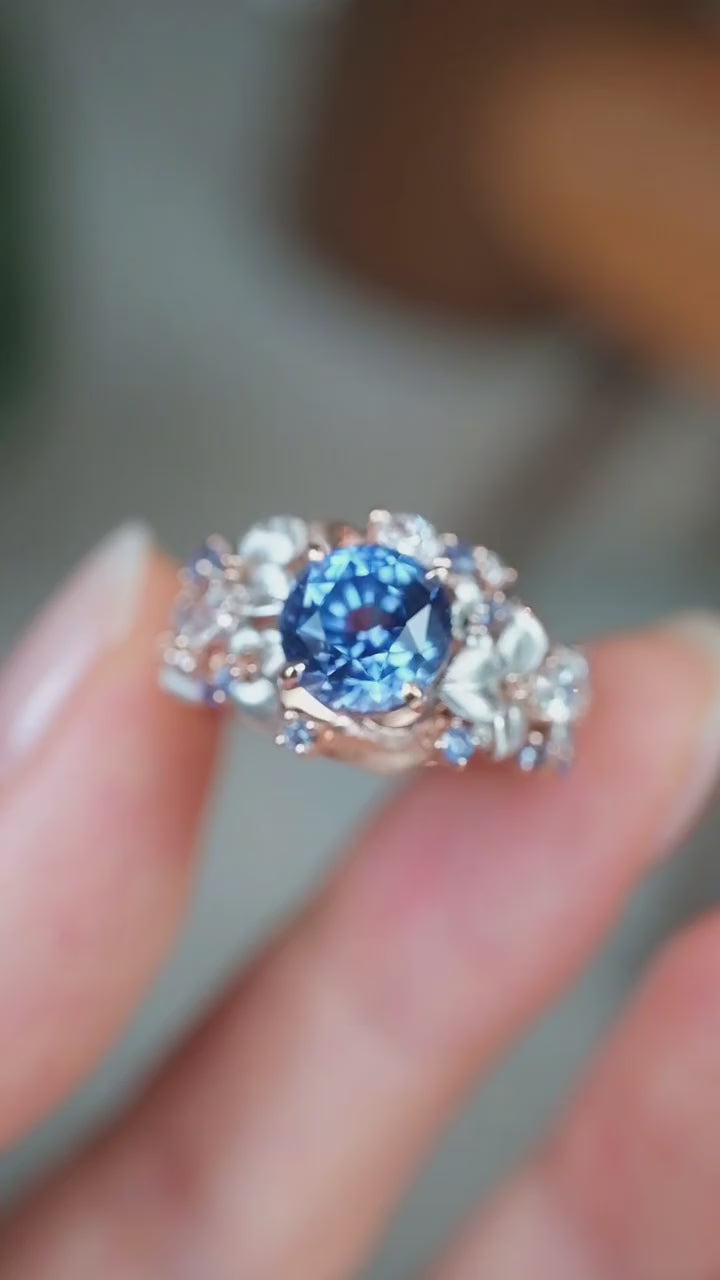 Celestielle Floral Halo Blue Sapphire Ring with rose gold and white gold setting