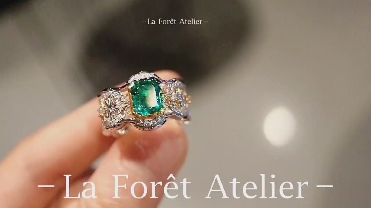 Regal full eternity band with emerald and lab diamond detailing








