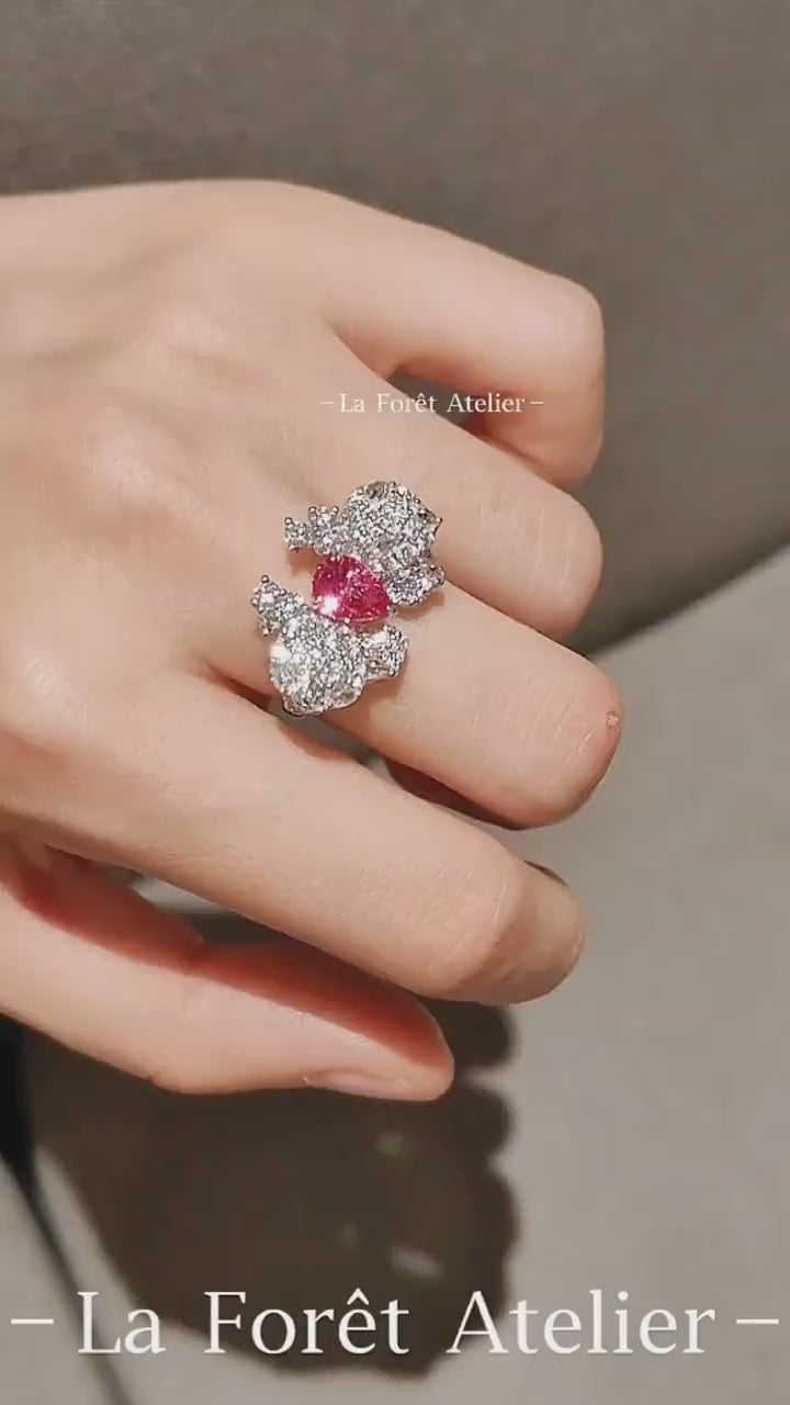 Bold cluster ring with 0.4ct heart-shaped pink spinel








