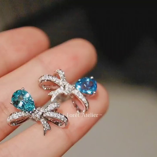 Lab-grown gemstone earrings with ribbon design

