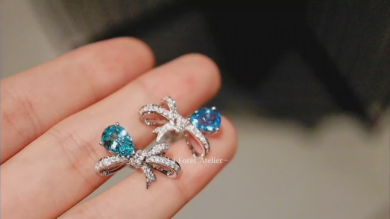 Lab-grown gemstone earrings with ribbon design


