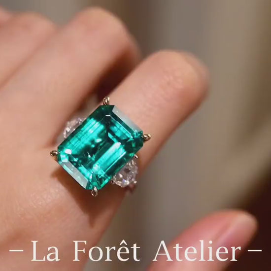 Vaetia ring with 10ct lab grown emerald and side diamonds in gold setting








