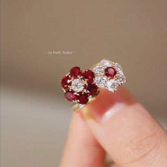 Open floral ring with lab-grown rubies and diamonds in solid gold setting








