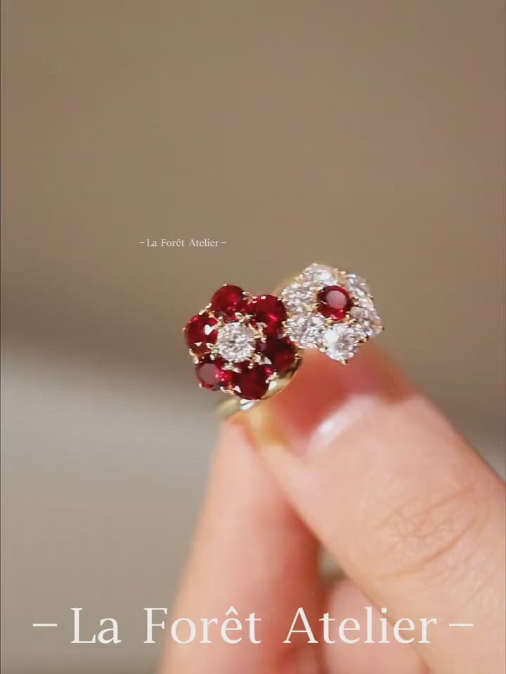 Open floral ring with lab-grown rubies and diamonds in solid gold setting








