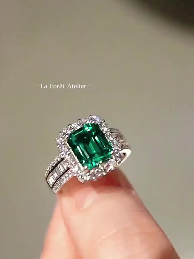 Aralyn ring with 2ct lab emerald and lab diamond halo on split shank band








