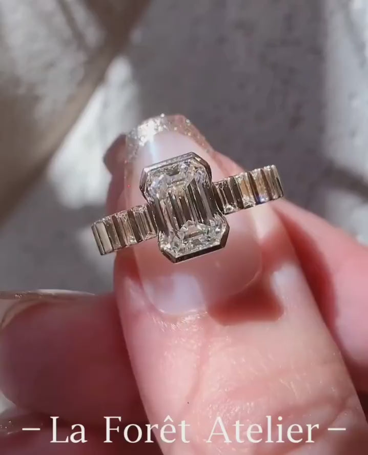 Emerald-cut lab diamond ring with baguette band

