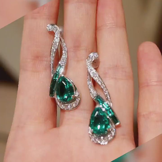 Nyelle earrings with 2ct lab emerald teardrops, baguette accents and pavé setting








