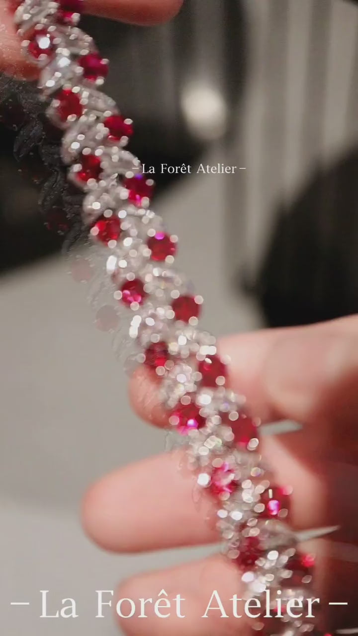 Vespera bracelet with vivid lab-grown rubies and diamond-accented leaf details in white gold – luxurious nature-inspired fine jewelry