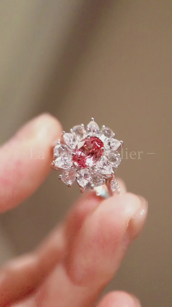 Dravena ring with 1ct lab-grown padparadscha sapphire and diamond petal halo in floral white gold setting – romantic fine jewelry design

