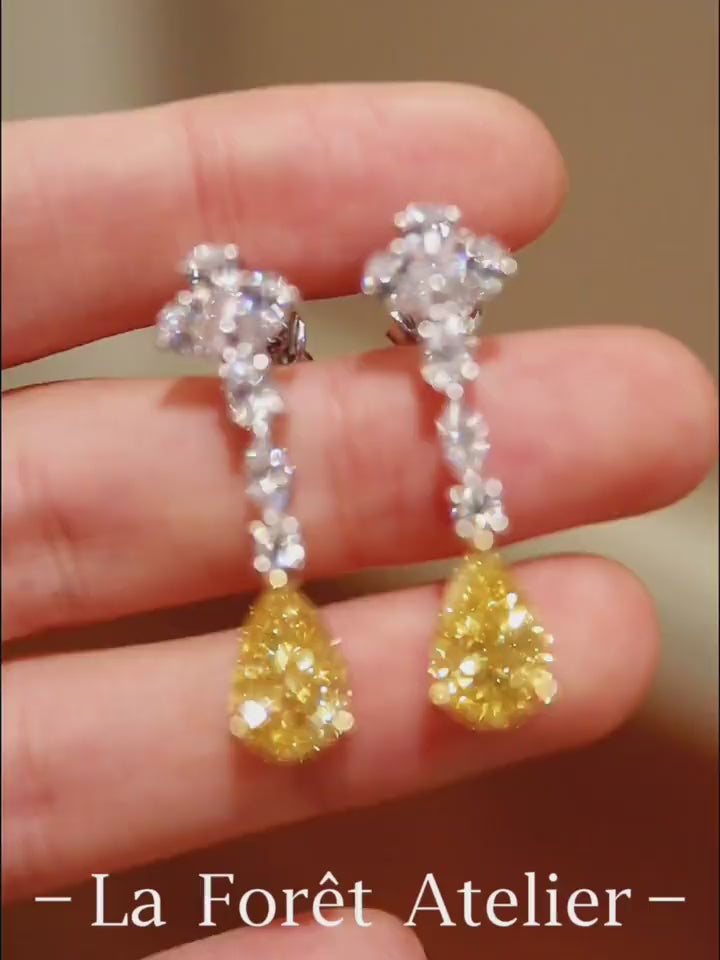 Sorelia drop earrings with 1.5ct lab-grown yellow diamonds and white lab diamonds in a cascading design


1/2








