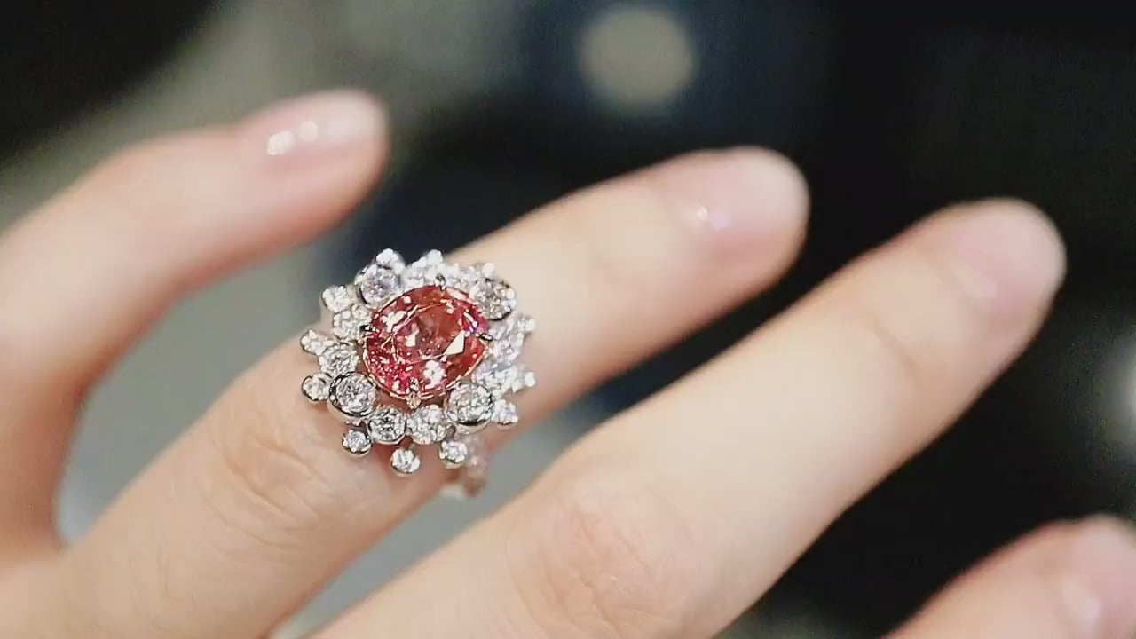 Lab-grown padparadscha cocktail ring with floral diamond design








