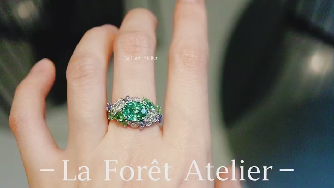 Colorful floral tsavorite statement ring with gemstone accents








