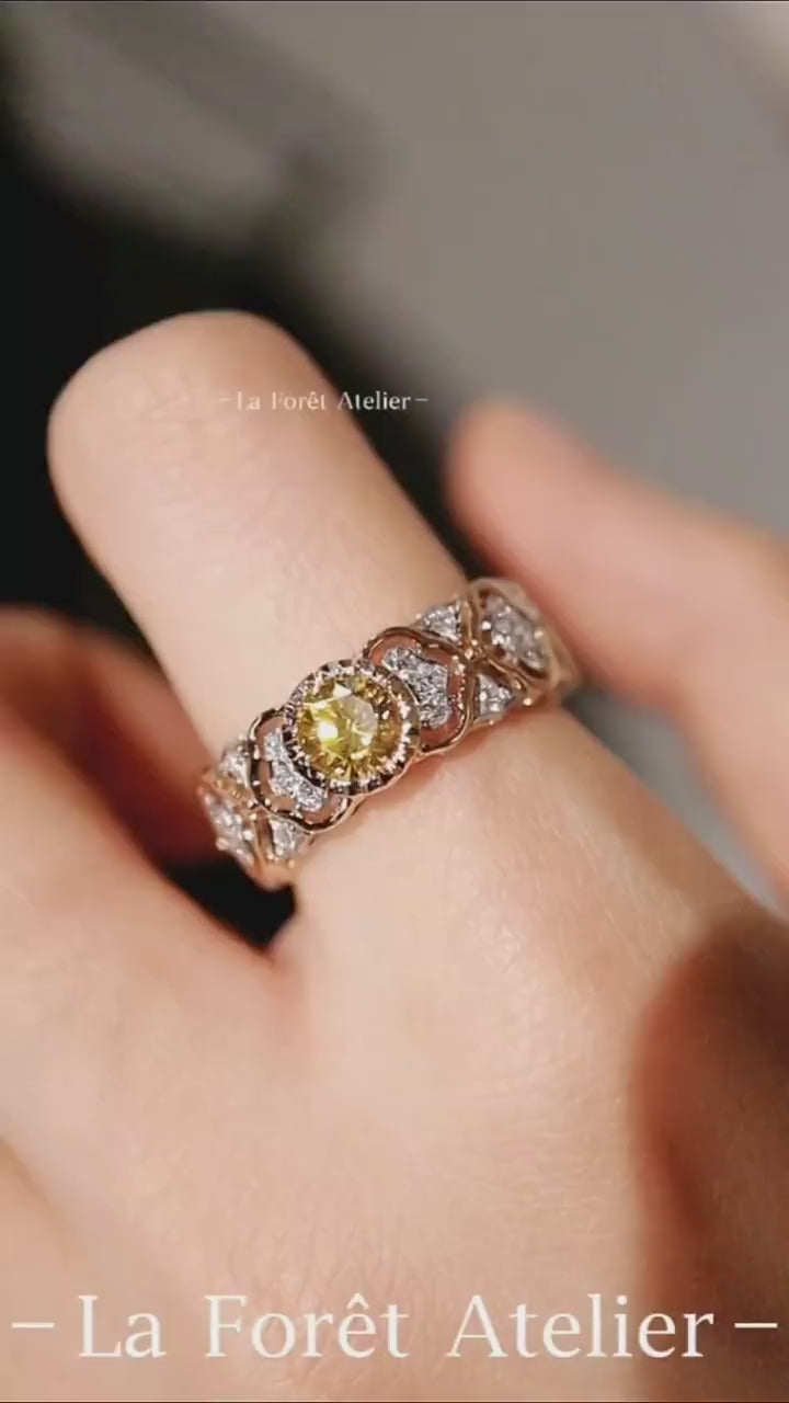 Vintage floral ring with 0.6ct lab yellow diamond and white diamond accents








