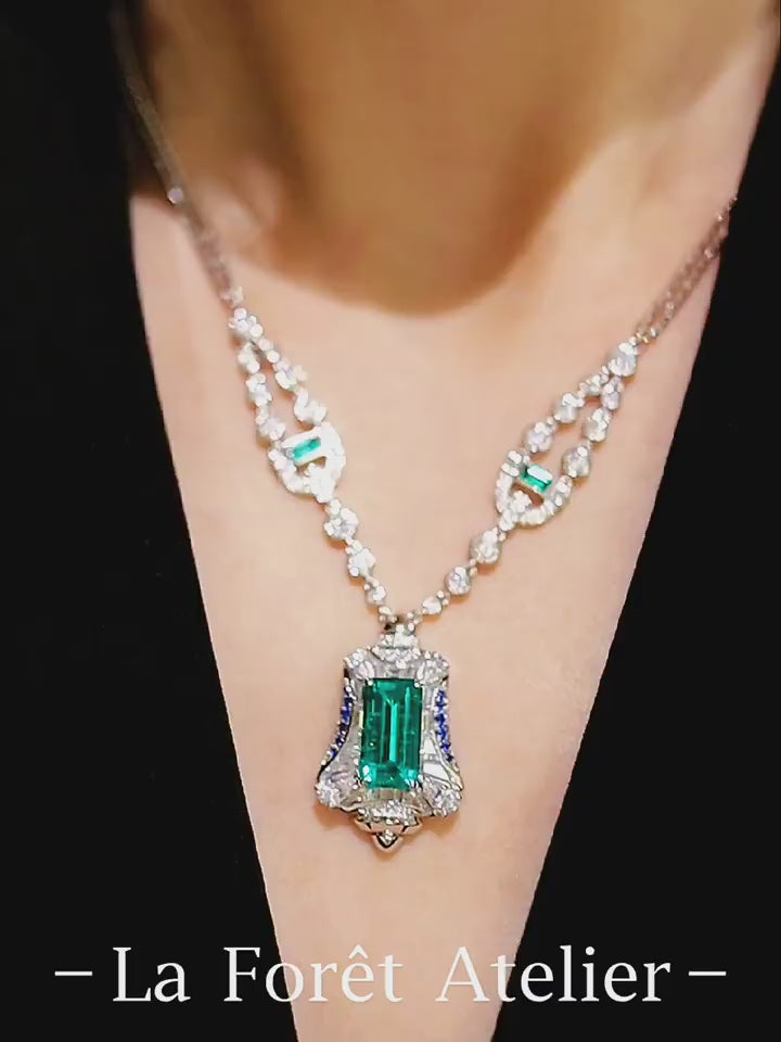 Seraphine vintage emerald pendant necklace on model








