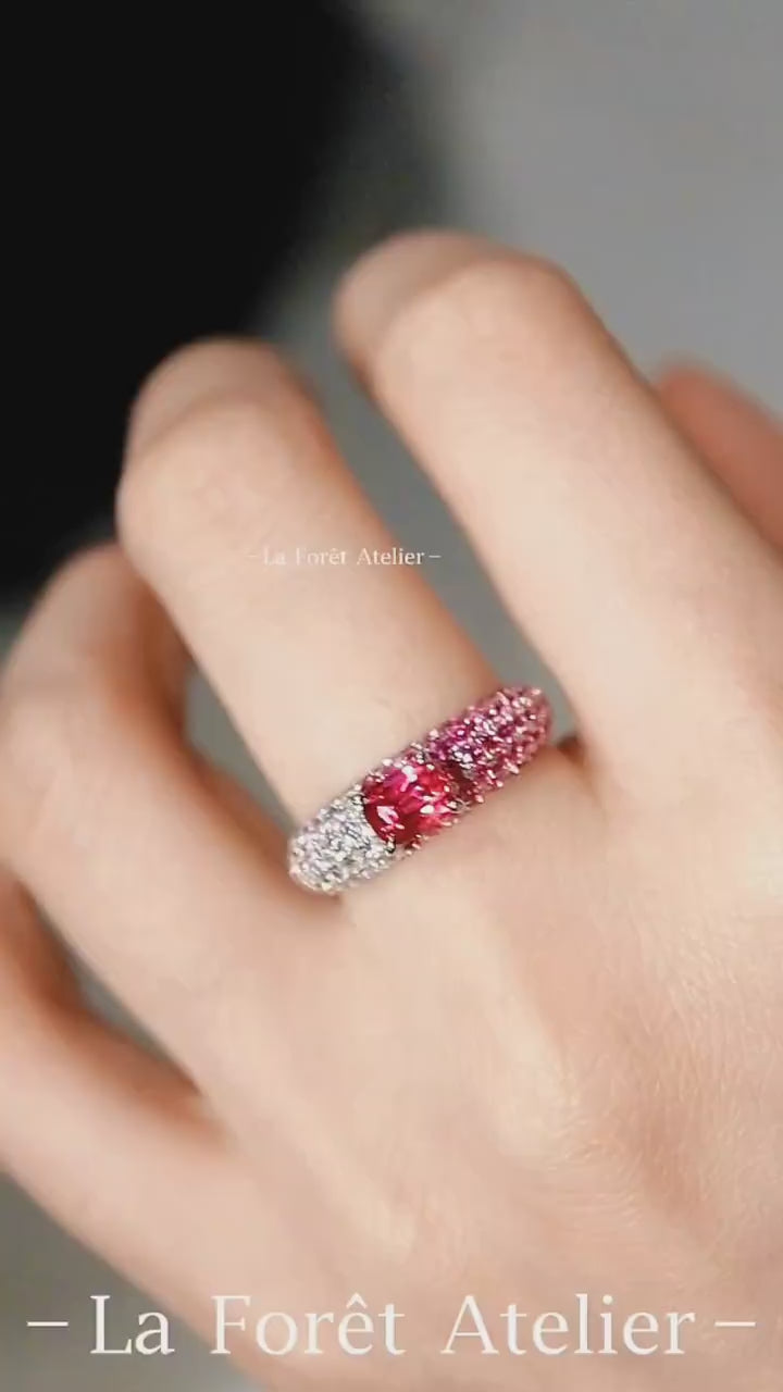 Pink gradient eternity band with padparadscha center








