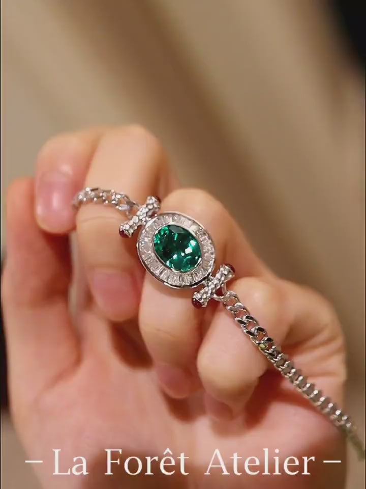 Caelia bracelet with 3ct lab emerald and diamond halo on silver chain








