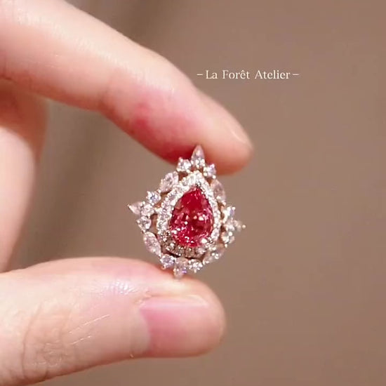 2.5ct lab padparadscha sapphire pendant with marquise and round diamonds in 14k gold








