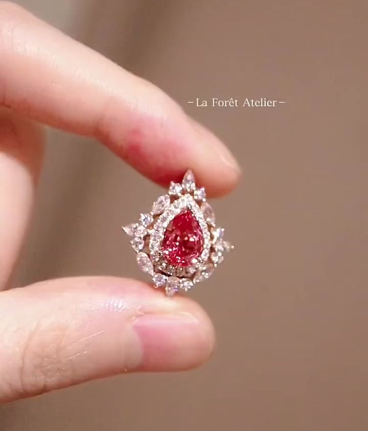 2.5ct lab padparadscha sapphire pendant with marquise and round diamonds in 14k gold








