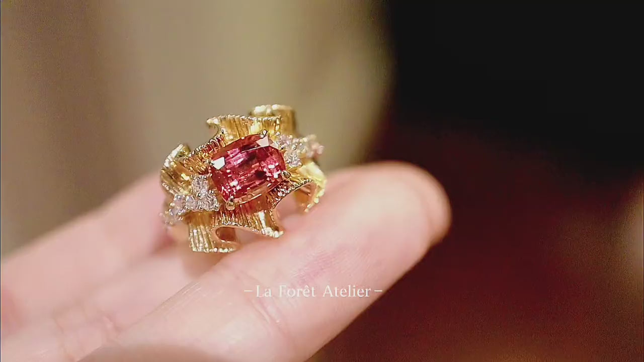 Zorelle ring featuring 3ct pink tourmaline set in sculpted gold with diamond accents









