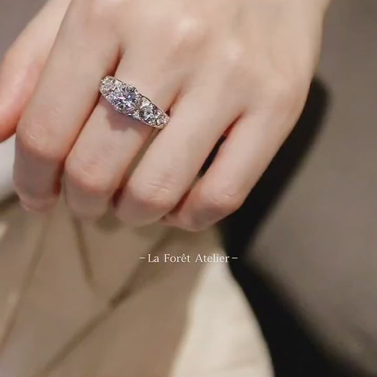 Cathedral setting engagement ring with round lab-created diamond

