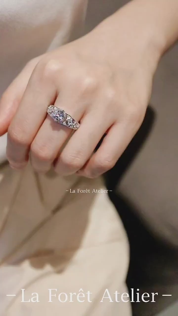 Cathedral setting engagement ring with round lab-created diamond

