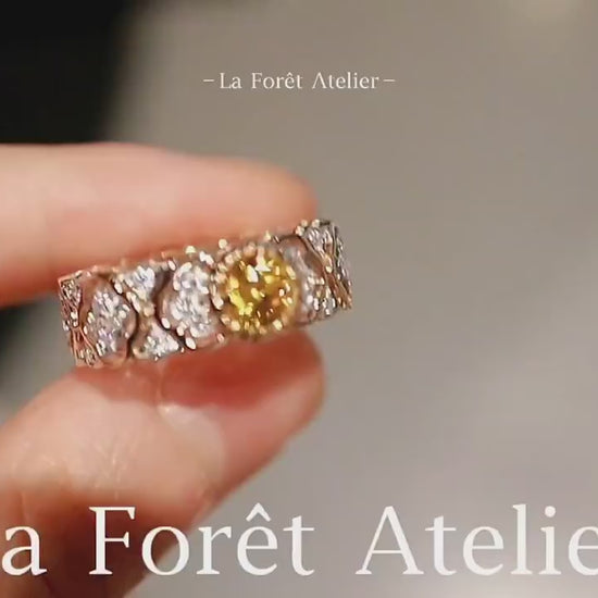 Elegant ring with 0.3ct yellow diamond and lab diamonds








