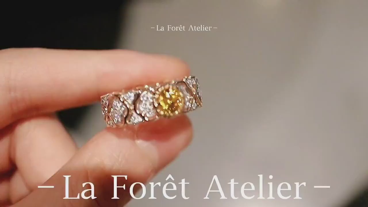 Elegant ring with 0.3ct yellow diamond and lab diamonds








